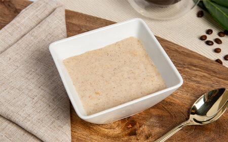 VLCD apple and cinnamon porridge in a square white bowl