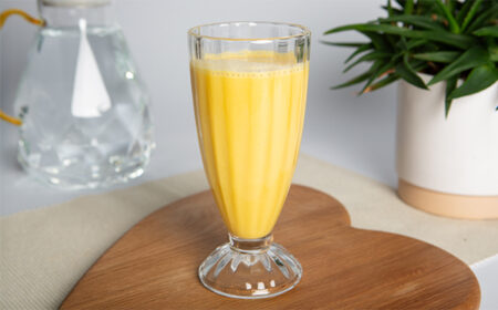 VLCD mango & passionfruit shake in a milkshake glass