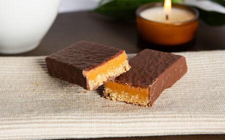 Two halves of a salted caramel meal replacement bar