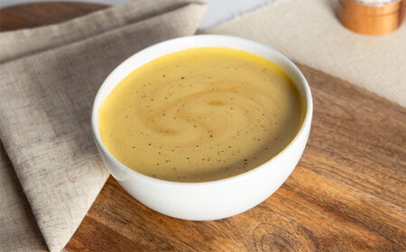 spicy sweet potato and carrot VLCD soup in a white bowl